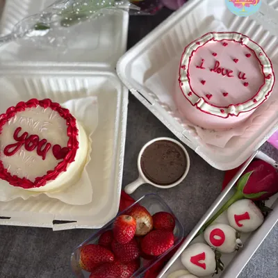 Celebrate Valentine's Day with my premium treats. This spread includes "I love you" bento cakes, chocolate-covered strawberries, and fresh roses for your special someone.