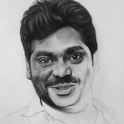 A work-in-progress shot of a realistic portrait of Zakir Khan. You can see how I build up the skin texture and features on one side while the other side is still a basic line drawing.