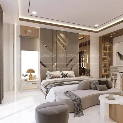 A masterclass in luxury bedroom design. This space features a stunning geometric headboard wall with gold accents, a curved chaise lounge, and integrated cove lighting for a hotel-like feel.
