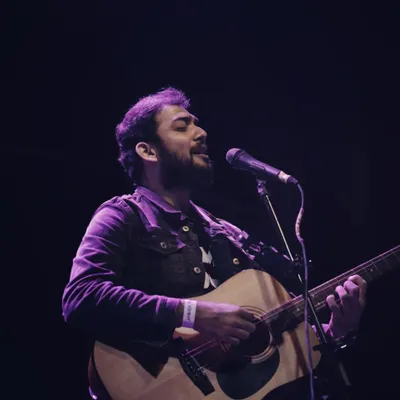A surreal experience performing my original songs at Fandom. This photo captures the feeling of sharing my own music with a live audience, a moment of pure connection.
