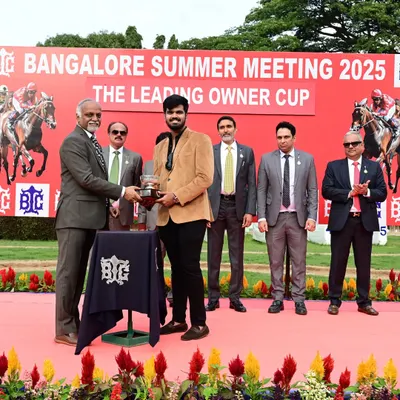 Mr. R. Manjunath Ramesh, Chairman of the Bangalore Turf Club, presents The Leading Owner Cup to the connections of Bezawada Sultan.