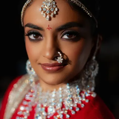 A stunning bride glowing on her wedding day. My goal is to create this kind of healthy, luminous skin that makes makeup look flawless and lets your confidence shine.