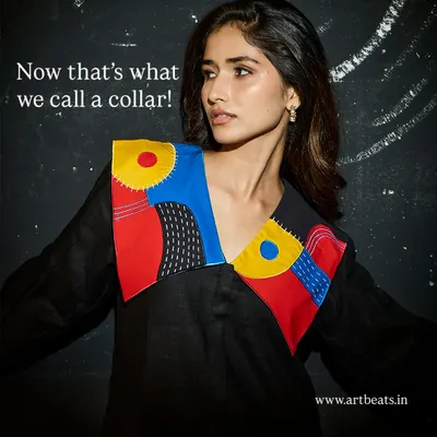 Now that's what we call a collar. This black linen dress features an oversized, hand-detailed collar with my bold, abstract artwork, turning a simple silhouette into a true statement piece.