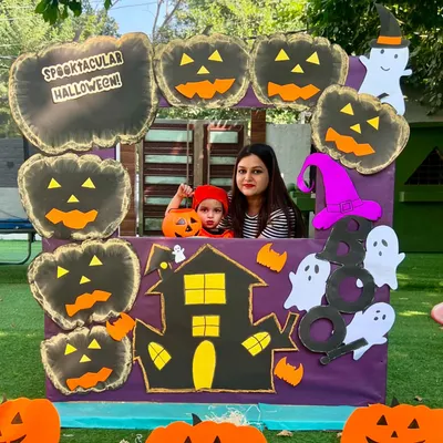 A spooktacular Halloween photo booth ready for memories. I create fun, themed corners like this for families to capture the joy of the day.