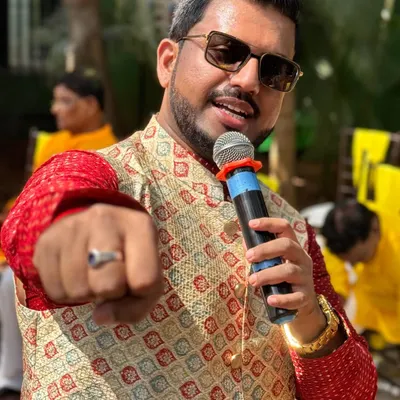 My signature pose. Microphone in hand, ready to spread happiness and get the party started.