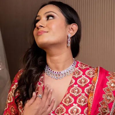 A close-up of a beautiful diamond and ruby style necklace set. Renting jewellery is a smart way to perfectly match your accessories to your outfit for every single function.