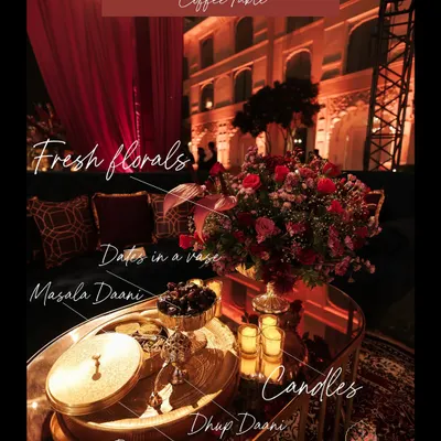 Deconstructing the coffee table for a Moroccan-themed lounge. I layered elements like fresh florals, a traditional brass 'masala daani', dates, and candles on a brass tray to create a rich, authentic, and multi-sensory experience.