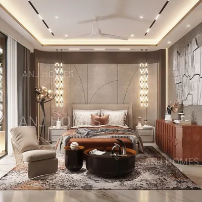 A luxury master bedroom where every element is carefully curated. The design features a fully upholstered back wall, statement pendant lights, and a mix of textures on the rug and furniture to create a warm, inviting, and sophisticated space.