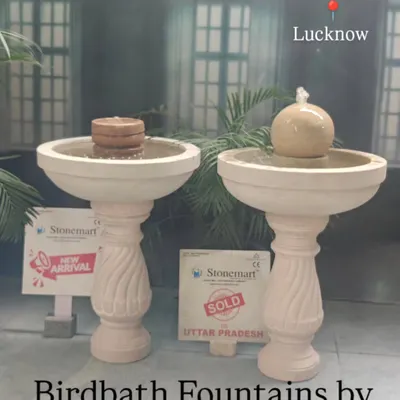These are my birdbath fountains, shown here in two styles. The one on the right, with the sphere top, was recently sold to a client in Lucknow, while the other design is still available. They are perfect for attracting birds to your garden.