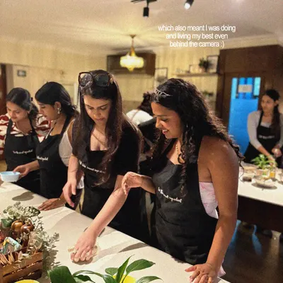 A little glimpse into one of my hands-on art workshops. I love seeing people get creative and bring their own ideas to life, whether it's on sneakers or leather goods. Everyone is focused on their project, and I'm there to guide the process.