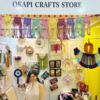 Here I am at a local exhibition, surrounded by my creations. It means the world to me to meet customers in person and see them connect with a piece I've poured my heart into. Thank you for all your love and support!