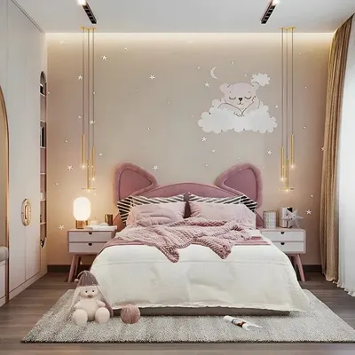 A soft and elegant girl's room with a sophisticated pink and beige color palette. The design features a cat-ear headboard, pendant lighting, and a cozy window seat with storage.