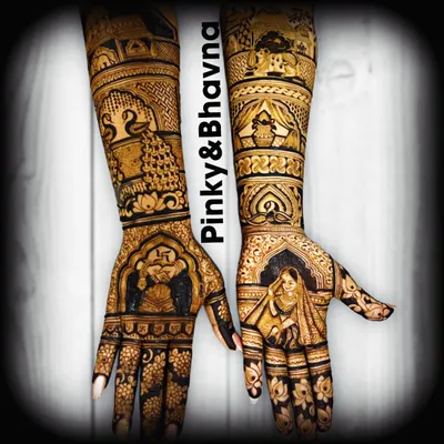 A complete bridal set telling a story from every angle. One hand features a portrait of the bride in her veil, while the other shows a depiction of Ganesh, symbolizing auspicious beginnings. The arms are filled with classic motifs like peacocks and elephants.