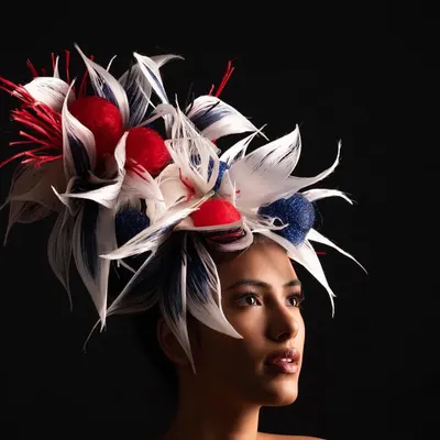 This avant-garde hair art piece is named 'Autumn Season'. It was created to represent the beautiful and mesmerizing colors of fall, symbolizing the idea that every ending is a new beginning.