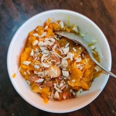 A meal isn't complete without dessert. Our piping hot Gajar ka Halwa, topped with sliced almonds, is the perfect way to finish your authentic North Indian feast.