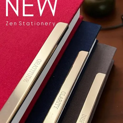 Our new Colton Notebooks are made for mindful moments. They feature pure cotton covers, handmade paper, and a golden brass clip etched with words like 'Gratitude', 'Clarity', and 'Inspire' to ground your day.