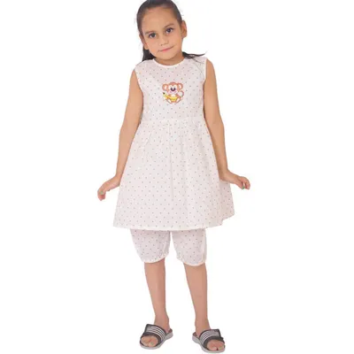 A clean, front-facing e-commerce shot of a girl's frock and capri set. This type of image is standard for Amazon and Flipkart listings.