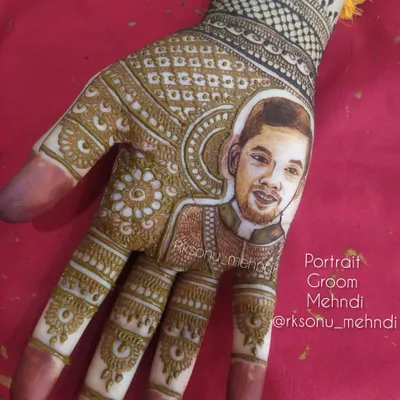 This is a wonderful example of a groom's portrait mehndi. He wanted a portrait of himself on his palm, and it was a pleasure to create this detailed piece for his wedding day.