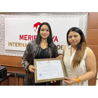 Another proud graduate receives her certificate. I am so excited to see the amazing career she will build with the skills learned at my academy.