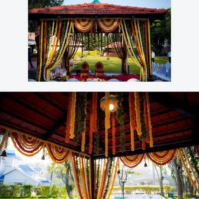 A beautifully decorated mandap set in a lush green lawn, ready for a wedding ceremony. We capture the grandeur of your event setup.