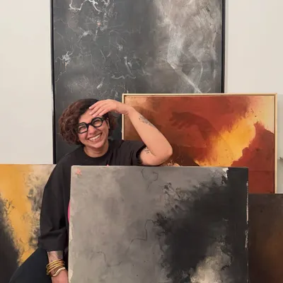 I've been a calligrapher for years, but recently, art started taking the lead. This photo was taken as I was transitioning my work and my website to reflect where I am now. It's me, surrounded by my new direction.
