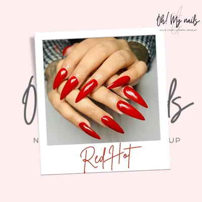 Sometimes, a single colour makes the boldest statement. This set features dramatic, long stiletto nails coated in a vibrant, glossy red polish.