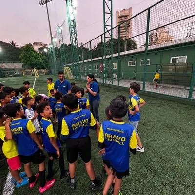 Our U9 and U11 players gather around sports psychology experts from Mpower Minds for a post-session talk. This shows our commitment to building mentally strong and intelligent footballers from a young age.