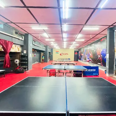 A view from behind the table. You can see the full length of our academy, with plenty of space for multi-table play and coaching sessions.