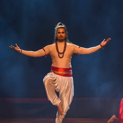 Our lead choreographer, Aryan, captured in a traditional dance pose. This image showcases his deep connection to the art form and his expertise in classical and contemporary Indian dance.