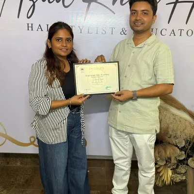 Another successful student receiving her certificate of completion. I am confident in her skills to create beautiful hairstyles for her clients.