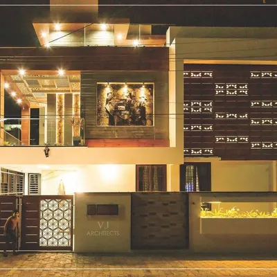 This night shot of a completed residence in Hubli shows the impact of a well-executed lighting plan. We used a combination of spotlights on the facade, uplighting for artwork, and soft light within the integrated planter to create depth and drama.
