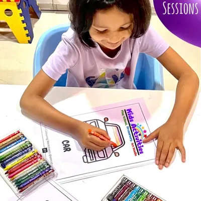A moment of focused creativity as a young student enjoys a coloring session. We provide a calm and encouraging space where children can immerse themselves in their art.