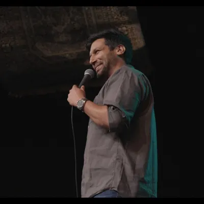 A shot of comedian Kanan Gill during his stand-up special in Bengaluru. I provided a professional, shine-free makeup application that held up under stage lighting for all four of his shows.