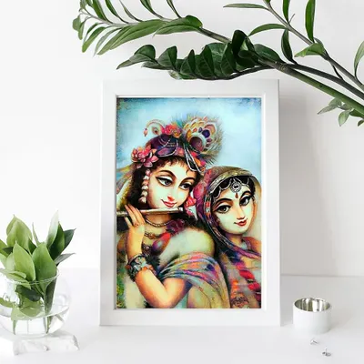 This 'Radha Madhav' painting is a small, intimate piece perfect for a personal space. It captures a quiet moment between Radha and Krishna, with Krishna holding his flute, symbolizing the divine music that connects their souls.