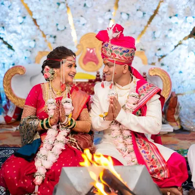 A beautiful moment during a Maharashtrian wedding ceremony, as the couple performs the Havan ritual together. I focus on capturing the sacred fire and the couple's expressions of devotion.