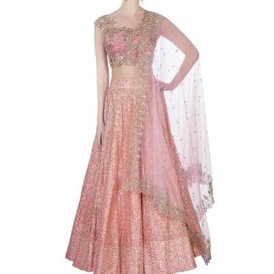 This is a custom-stitched bridal lehenga with intricate sequin work, designed for a client's special day. I focus on creating a flattering silhouette with a perfectly fitted choli and a flowing skirt, ensuring the entire ensemble feels both grand and comfortable.