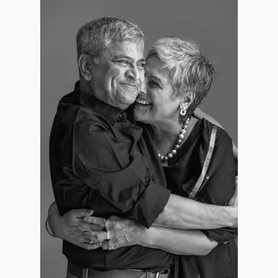 A tender moment captured during a couple's portrait session. These images focus on the quiet, intimate interactions that showcase a lifetime of love and companionship.
