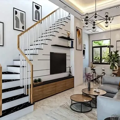This open-plan living area features a TV unit integrated with the staircase, a clean and space-efficient solution. The design uses a monochrome palette with black marble steps and light wood accents for a contemporary look.