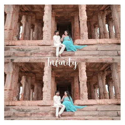 A wide-angle maternity portrait set against the stunning architecture of ancient temple steps. This shot combines the grandeur of the location with the intimate, happy moment shared by the couple.