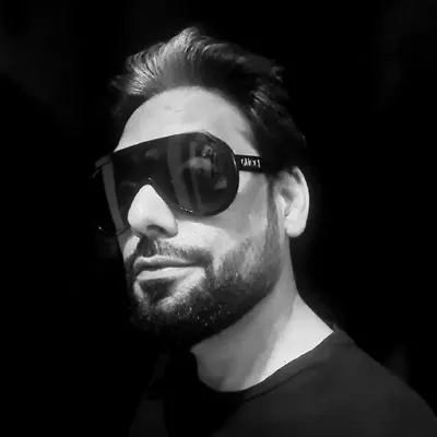 The signature look. Whether I'm producing an event or behind the console, I'm always focused on the details. The sunglasses are just part of the uniform.