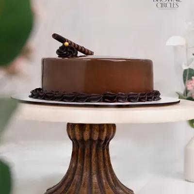 This is my classic Chocolate Truffle Cake, a favorite for any celebration. I use only pure couverture chocolate for that deep, rich flavor, layered with a moist sponge and a glossy ganache finish. It’s elegance you can taste.