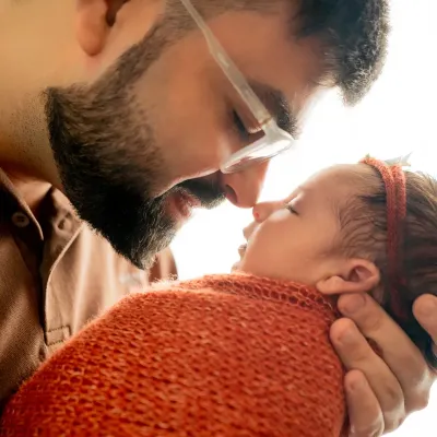 The journey doesn't end with the bump. This tender moment between a father and his newborn is what it's all about. I focus on capturing these first precious connections in a simple, heartfelt way.