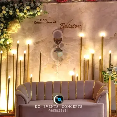 An elegant and serene stage for a First Holy Communion. The design features a soft color palette, candle-like floor lamps, and a chalice motif to honor the sanctity of the occasion.