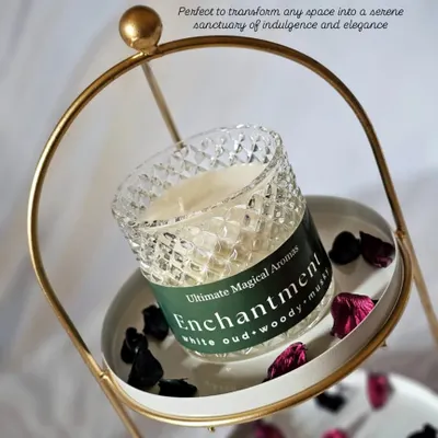 My 'Enchantment' Crystal Jar Candle, elegantly displayed. The white oud, woody, and musky notes of this fragrance are perfect for creating a serene sanctuary in your home.