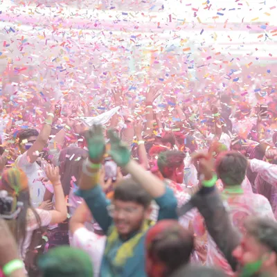 We know how to create an atmosphere of pure energy and celebration. This shot from a corporate Holi festival captures the peak of excitement, with a vibrant explosion of confetti over an engaged and happy crowd, demonstrating our skill in producing large-scale festive events.