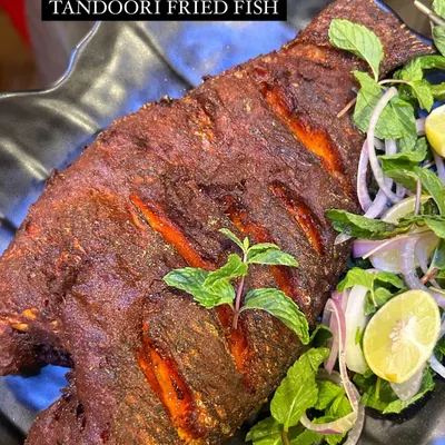 Our best-selling Tandoori Fried Fish, perfectly spiced and fried until golden brown. Served with a side of fresh mint, onions, and lemon, it's a complete sensory experience.