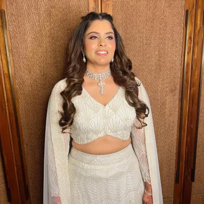 This is the 'Aadya Glow'. A look that focuses on luminous, healthy-looking skin, seen here on my bride Simran for her reception.