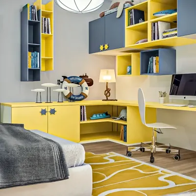 This nautical-themed kids' room is ready for adventure, with bright yellow and blue custom cabinetry. The L-shaped desk provides ample space for study, while details like the lifebuoy and ship-wheel knobs complete the fun look.