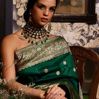 A stunning close-up from a shoot for Soho Begum, focusing on the intricate details of the hand-crafted Banarasi silk saree and jewellery. Our lighting setup is perfect for capturing the richness of luxury fabrics and accessories.