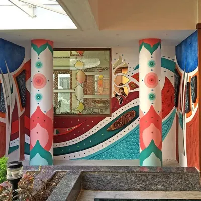 We transformed the entrance of this building with a vibrant, abstract mural covering the walls and pillars. This piece combines colorful geometric patterns with 3D sculpted elements to create a truly unique and immersive entryway.